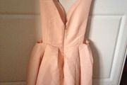 Brand new party dress in light peach colour