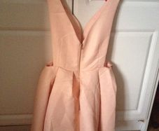 Brand new party dress in light peach colour