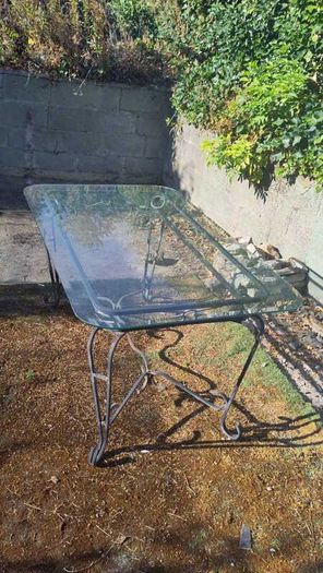 Garden table with glass top