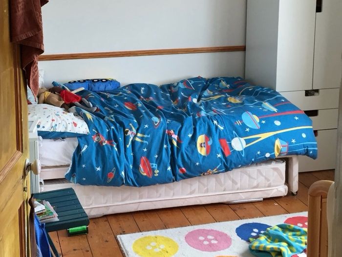 Single bed with trundle underneath