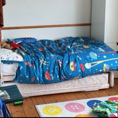 Single bed with trundle underneath