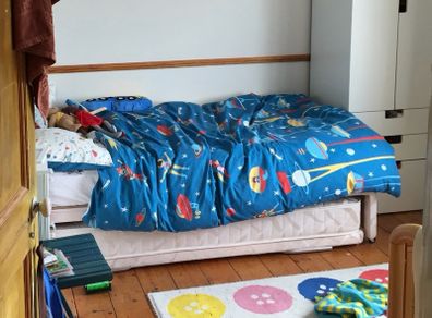 Single bed with trundle underneath