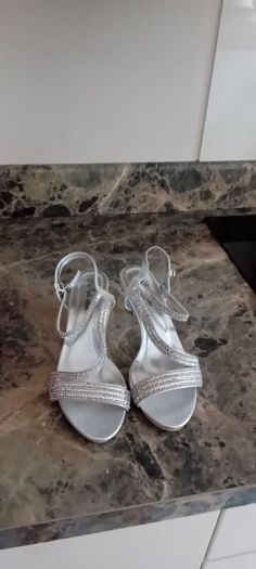 silver sandals and bag