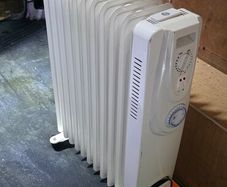 2 heaters next to new