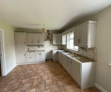 Kitchen and utility units with 2 sinks, dismantled and ready to collect