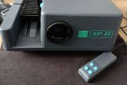 Nobo SP II slide projector (also manufactured in collaboration with Kindermann) with a 1:2.8 / 90 mm lens and a wired remote control
