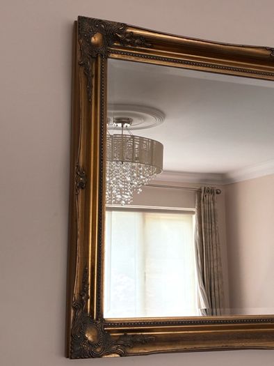 Ornate antique overmantel mirror