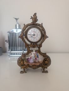 Antique porcelain hand-painted porcelain clock
