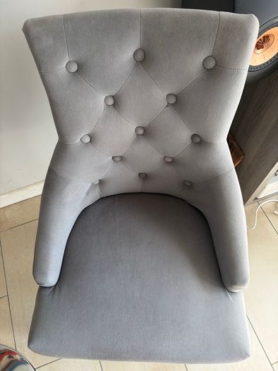 Glass table with velvet studded chairs