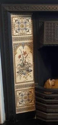 cast iron fireplace with timber surround