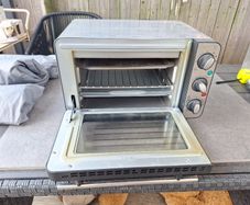 Silver crest mini oven. Great for camping,  light weight.  In full working order. Used a few times , otherwise in good condition.