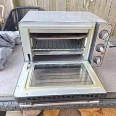 Silver crest mini oven. Great for camping,  light weight.  In full working order. Used a few times , otherwise in good condition.