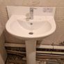 All together - bathtub, sink with a tap, bathtub glass, wall tiles Image 4
