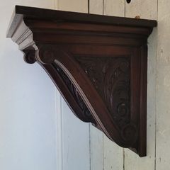 Antique carved mahogany corbel shelf
