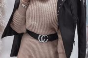 A striped sweater dress with a turtleneck