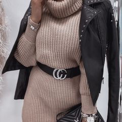 A striped sweater dress with a turtleneck