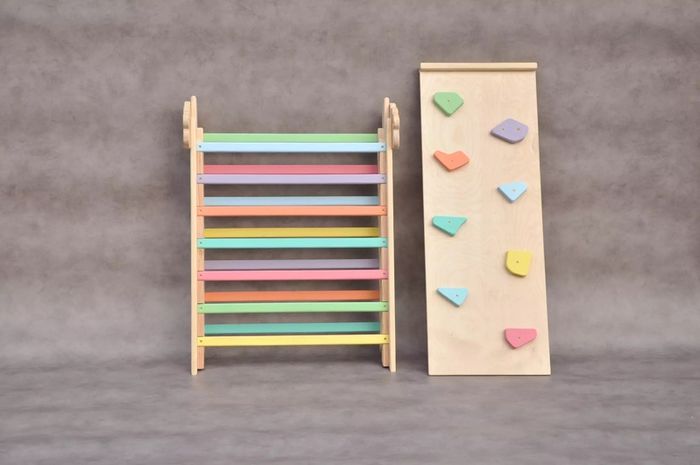 Kids wooden climbing frame with rock slide