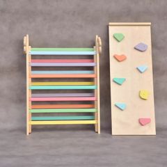Kids wooden climbing frame with rock slide