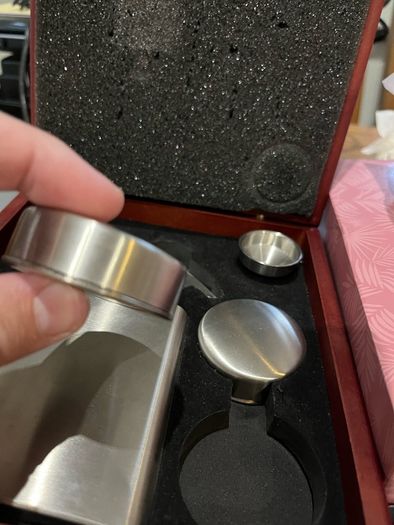 Drinks flask cups and cork screw
