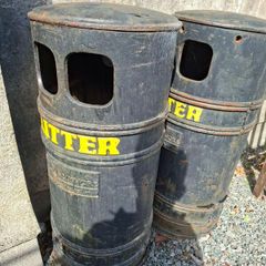 Three antique cast iron litter bins with bucket inserts