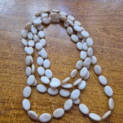 Shell beads in ivory necklace.