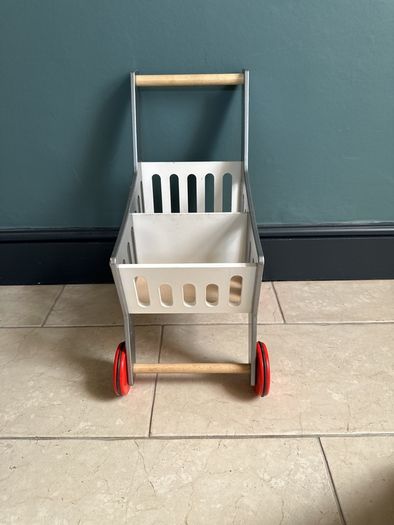 Kids wooden shopping trolley