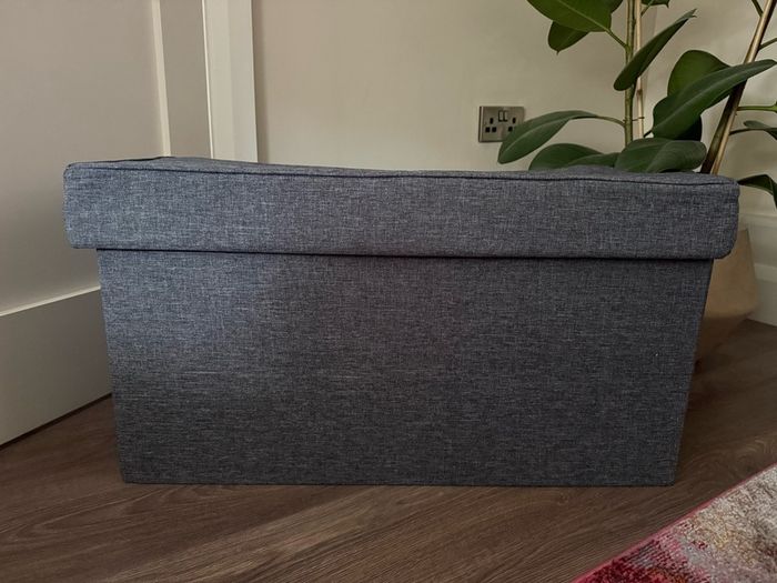 Grey ottoman storage box