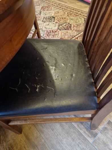 Round wooden table and four chairs
