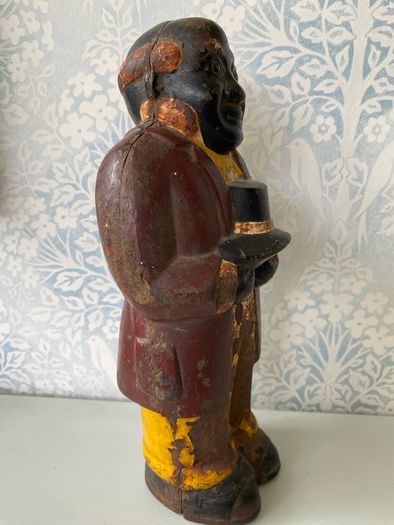 Original Cast Iron Uncle Moses Money box.