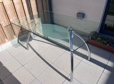 Glass and chrome dining table