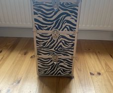 Beauty: 3-tier makeup and beauty storage case.