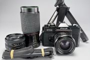 Fuji STX-2 SLR 35mm film camera plus 3 lenses