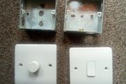 Dimmer. Switch.  And.  Light. Switch. And 2.  Flush.  Boxs