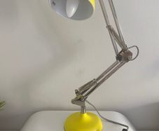 Yellow adjustable desk lamp with Chrome Articulated Arm