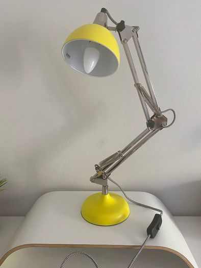 Yellow adjustable desk lamp with Chrome Articulated Arm