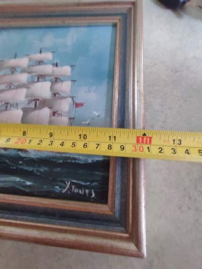Framed oil of a sailing ship on board signed Y. Jones