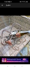 Matching steel wine holders never used.