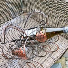 Matching steel wine holders never used.