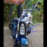 Fully Electric Chopper/Harley looks like a motorbike with matching side boxes Image 9