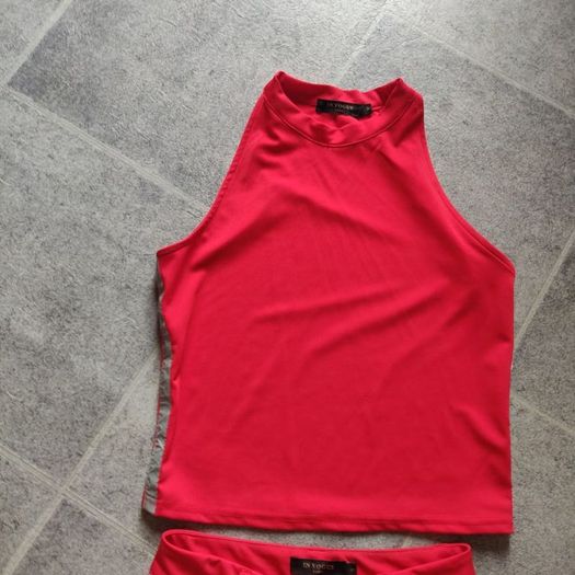 Red trousers and top set