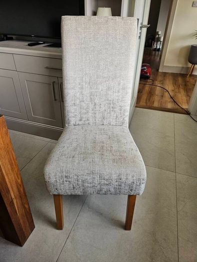 dining table and chairs oak table very good quality and solid chairs are as new  o marks or stains