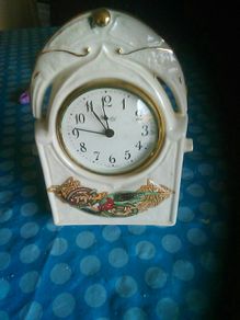 Small clock ornament