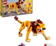 Creator 3 in 1 Wild Lion, Ostrich and Warthog Posable Animal Figures, Building Toys, Gifts for 7 Plus Year Old Boys & Girls
