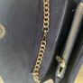 Stunning grey handbag with gold chain shoulder strap Image 5