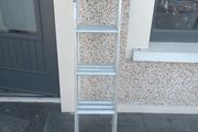 Three piece extendable ladder