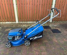 Propelled lawn mower + electric trimmer + petrol tank