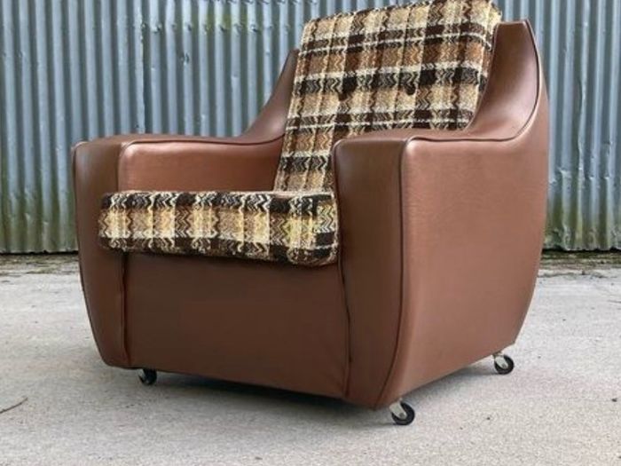 Vintage 1970s armchair on castors.