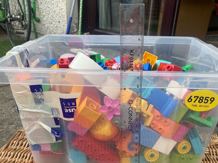 Box of Lego. 4 Figures and 4 Small Base Plates