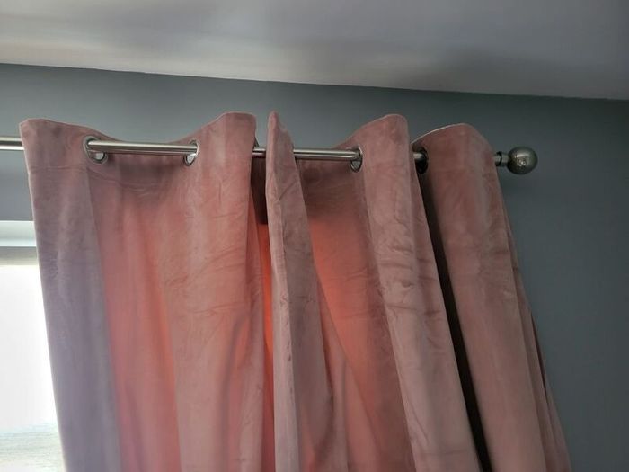 Dusky pink fully lined curtains with matching curtains