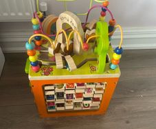 wooden activity cube